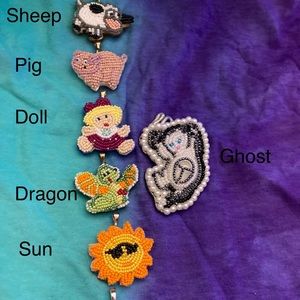 Choose your character. Hand made pendants for charms or keychains.